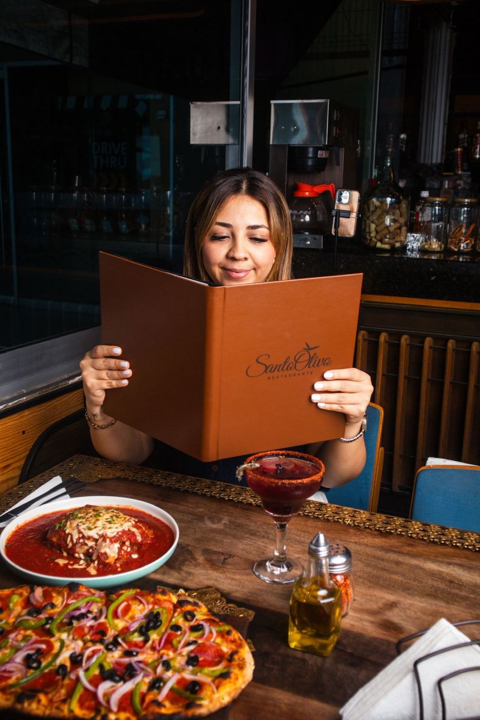 Guest reading the menu
